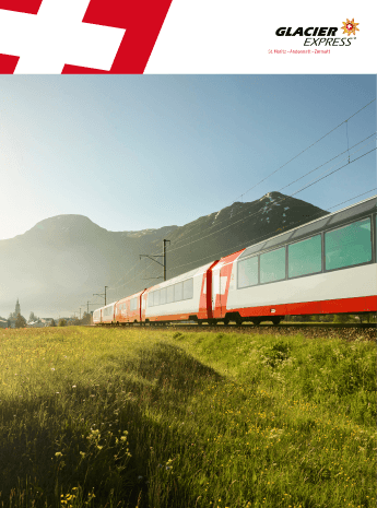 Auf der Broschüre ist der Glacier Express zu sehen, der durch ein grünes Tal vor Bergen fährt.